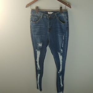 Indigo Stitch Distressed Jeans